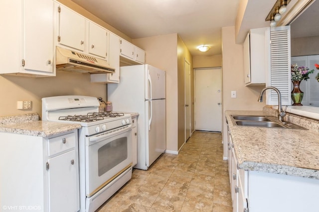 kitchen featuring white cabinetry, sink, and white appliances