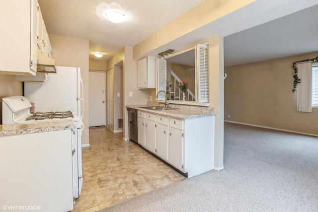 kitchen with white cabinets, light colored carpet, white gas stove, and sink