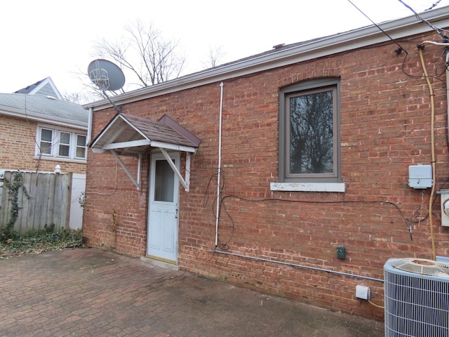 exterior space featuring a patio area and central air condition unit