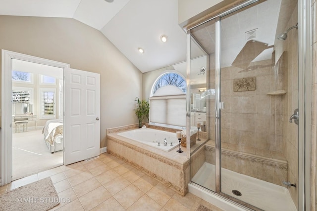 bathroom with shower with separate bathtub, lofted ceiling, a wealth of natural light, and tile patterned floors