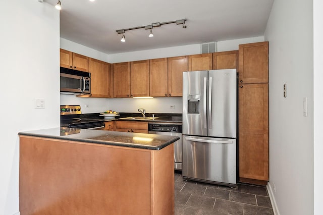 kitchen with sink and stainless steel appliances