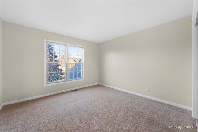 view of carpeted spare room