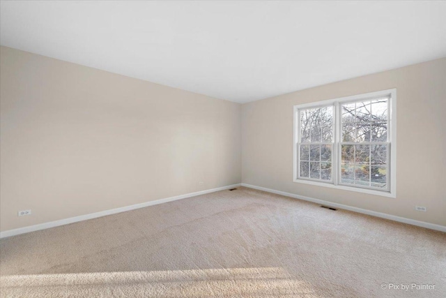 view of carpeted spare room