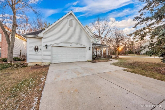 view of side of home with a garage