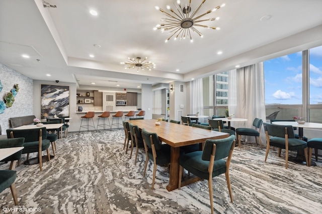 dining room with a notable chandelier