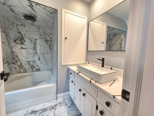 bathroom featuring vanity and bathing tub / shower combination