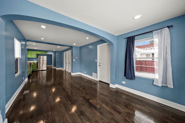 spare room featuring hardwood / wood-style flooring