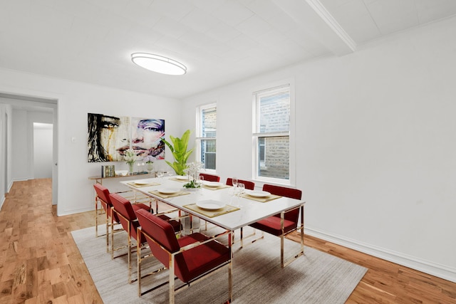 dining area with wood-type flooring