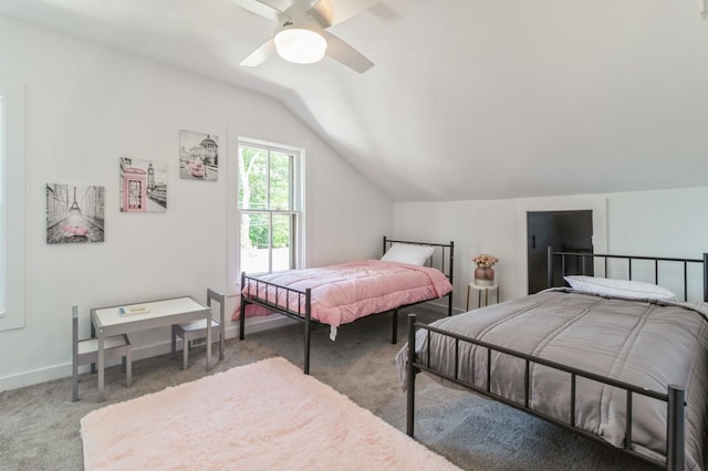 carpeted bedroom featuring ceiling fan and lofted ceiling