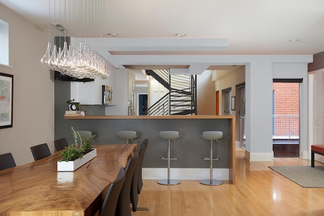 dining space featuring light hardwood / wood-style floors