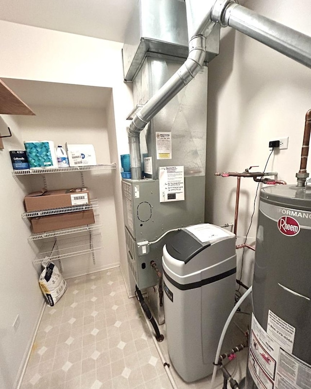 utility room featuring gas water heater