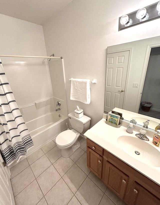 full bathroom with tile patterned flooring, vanity, toilet, and shower / bath combo with shower curtain