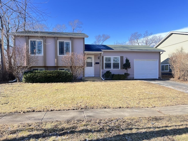 split level home with a garage