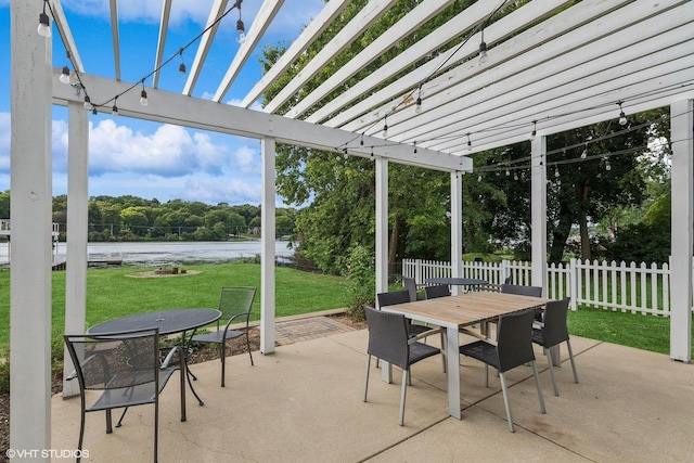 view of patio / terrace with outdoor dining area, a water view, fence, and a pergola