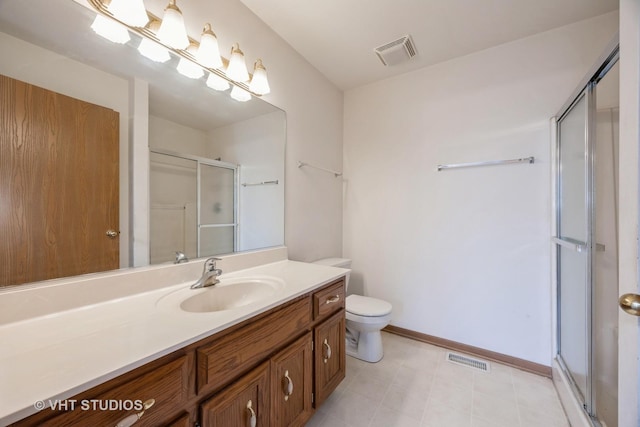 bathroom with vanity, toilet, and walk in shower