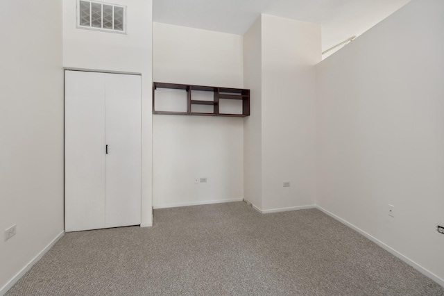 unfurnished bedroom with carpet floors