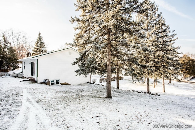 view of snow covered property