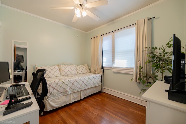 bedroom featuring dark hardwood / wood-style floors, ceiling fan, and ornamental molding