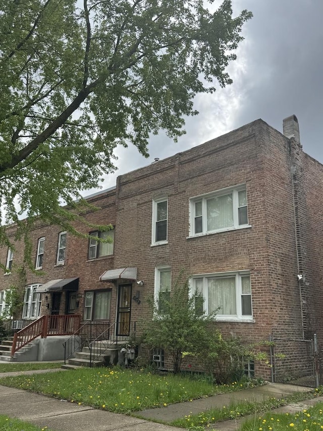 10642 S Langley Ave, Chicago, IL 60628 - view of front of home featuring brick siding