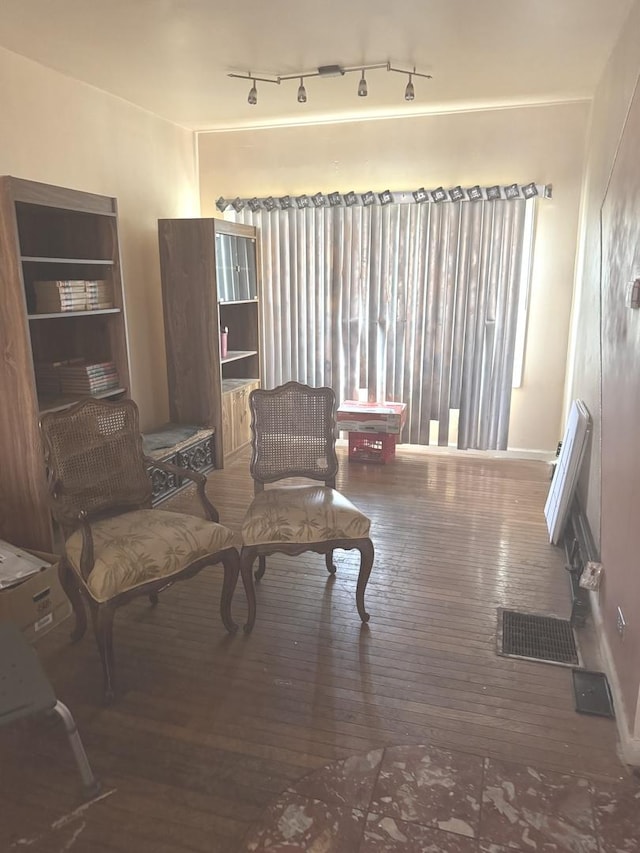 10642 S Langley Ave, Chicago, IL 60628 - living room featuring hardwood / wood-style floors and baseboards