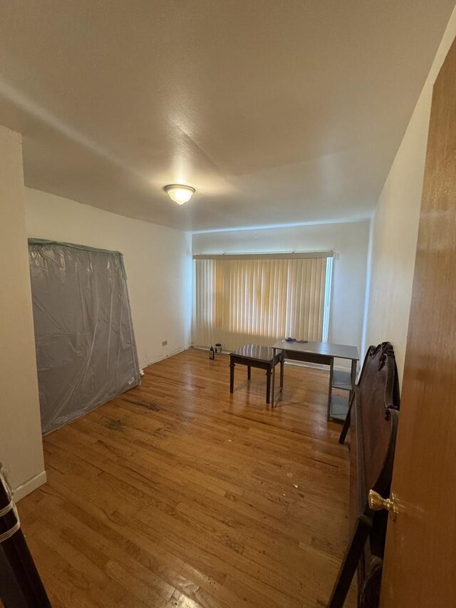 10642 S Langley Ave, Chicago, IL 60628 - playroom featuring wood finished floors