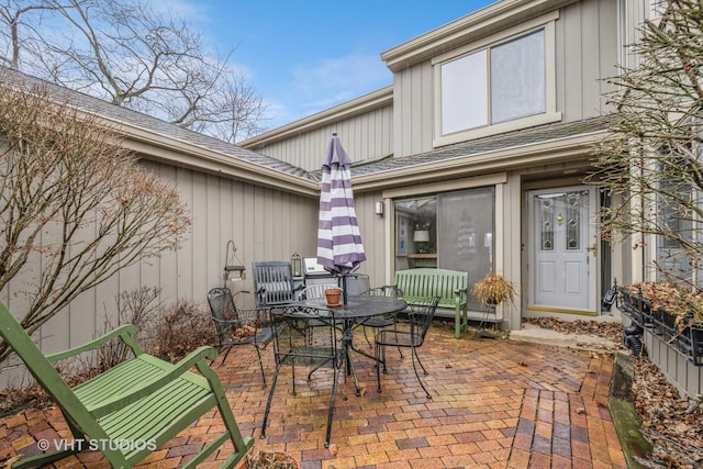 view of patio featuring outdoor dining area