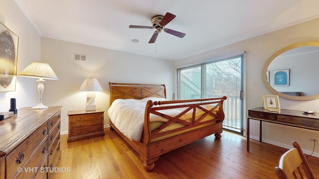 bedroom featuring access to exterior, visible vents, baseboards, and light wood-style floors