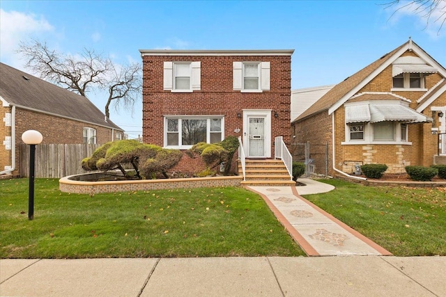 view of front of property with a front lawn