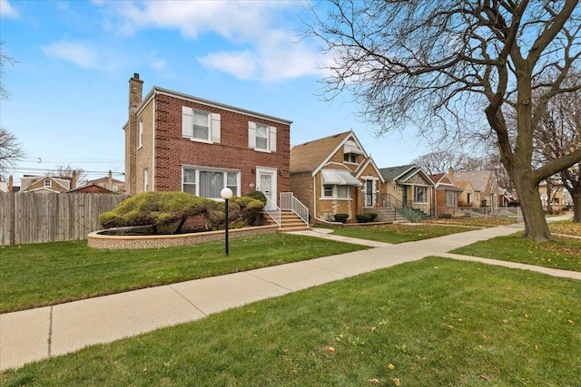 view of front facade with a front lawn