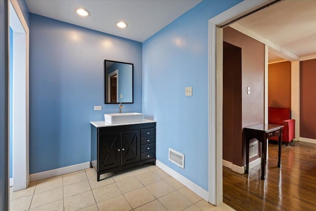 bathroom featuring tile patterned floors and vanity