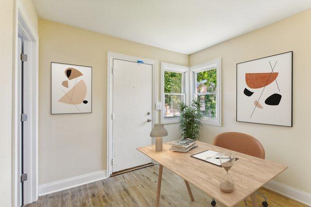 office with light hardwood / wood-style floors