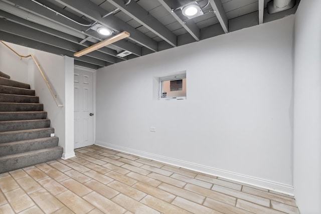 basement featuring light hardwood / wood-style floors