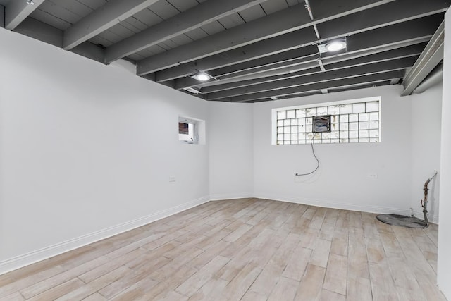 basement with light wood-type flooring