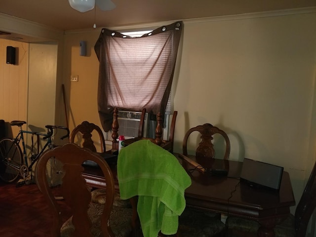 dining room with ceiling fan, cooling unit, and ornamental molding