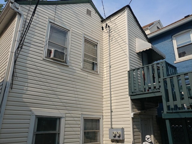 view of property exterior with a balcony