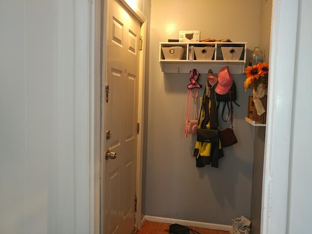 mudroom with parquet flooring