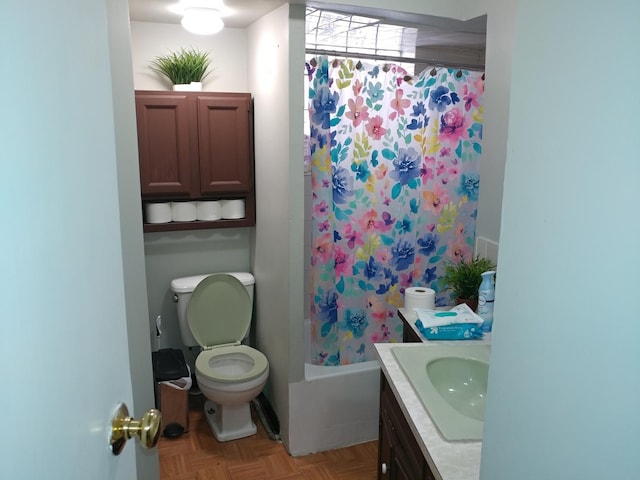 full bathroom featuring vanity, parquet floors, shower / bath combination with curtain, and toilet