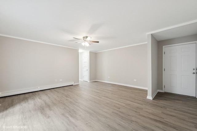 unfurnished room featuring ceiling fan, a baseboard radiator, wood-type flooring, and ornamental molding