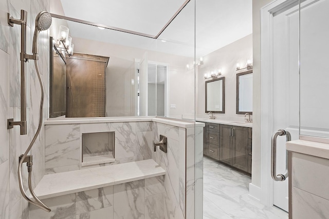 full bathroom with a sink, marble finish floor, and double vanity