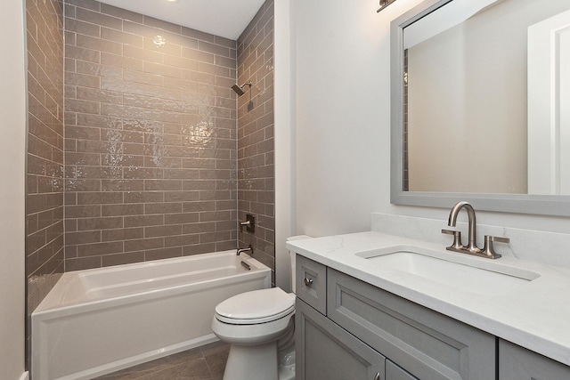 bathroom with tile patterned flooring, vanity, toilet, and shower / bath combination