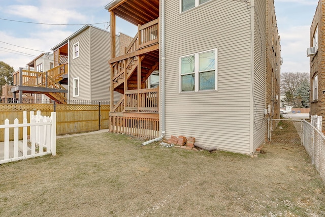 view of home's exterior with a lawn