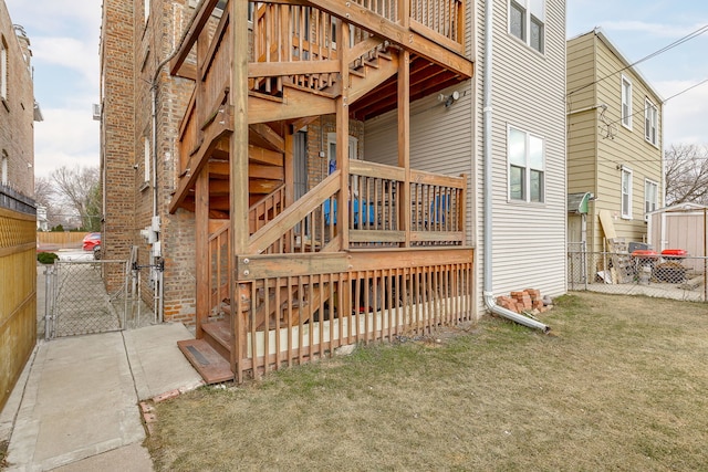 exterior space with a yard and a wooden deck