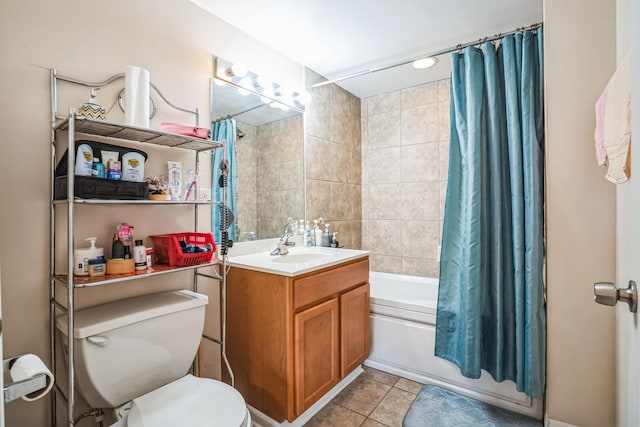 full bathroom with tile patterned floors, vanity, toilet, and shower / tub combo with curtain