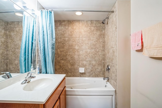 bathroom featuring vanity and shower / bath combo