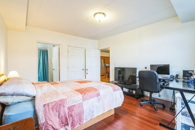 bedroom featuring hardwood / wood-style flooring