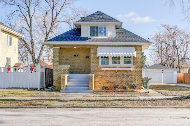 view of front of house featuring an outbuilding and a garage