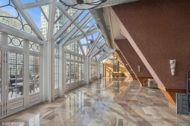 unfurnished sunroom with a healthy amount of sunlight