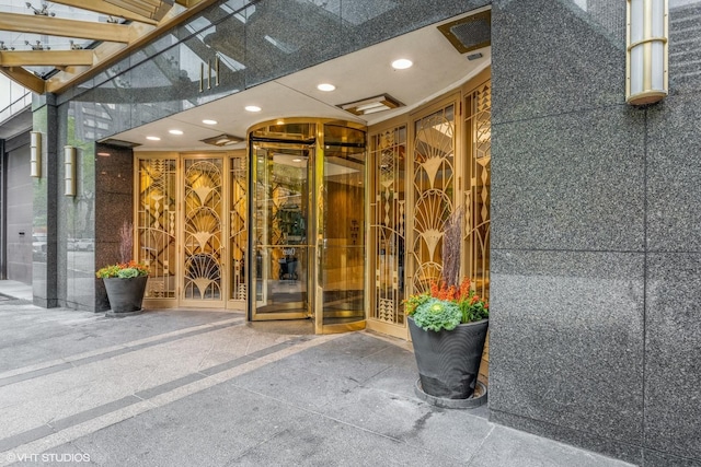 property entrance with a pergola