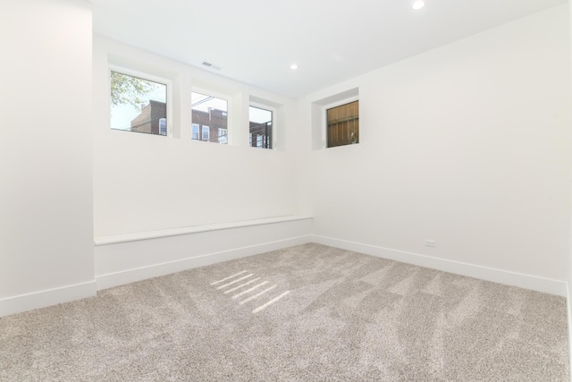 empty room with carpet flooring