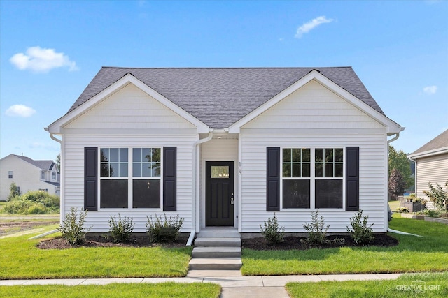 view of front of home featuring a front lawn